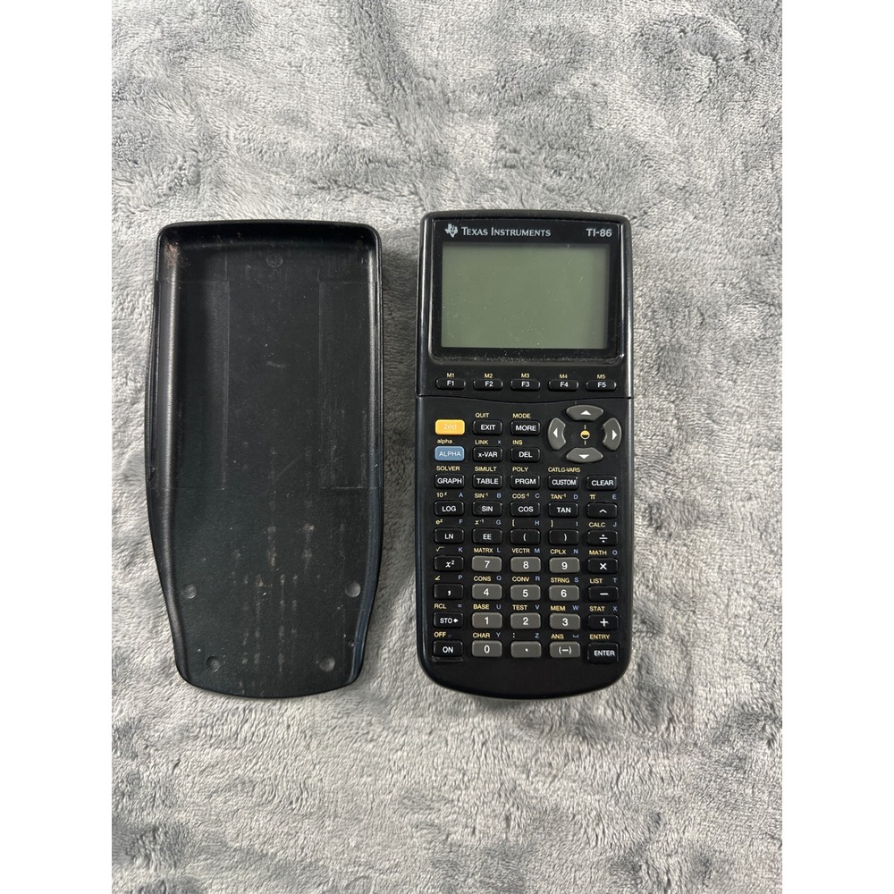 Texas Instruments TI-86 Graphing Calculator PARTS ONLY turns on but #s are faint